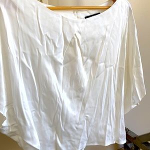 Very elegant crop top, silk like appearance.